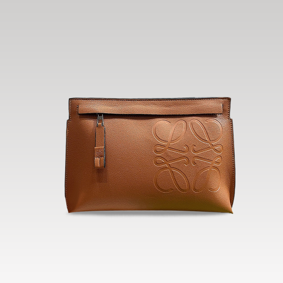 The Roewe Pouch clutch is brown